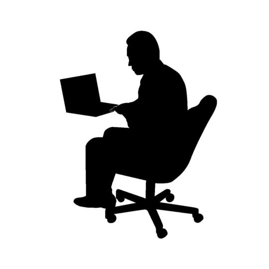 座って仕事をする人